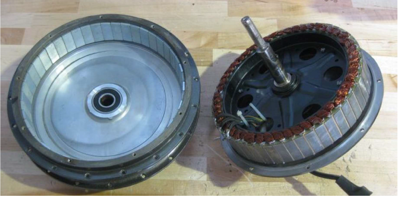 Low cost two-wheel vehicle motor using ferrite and aluminium.